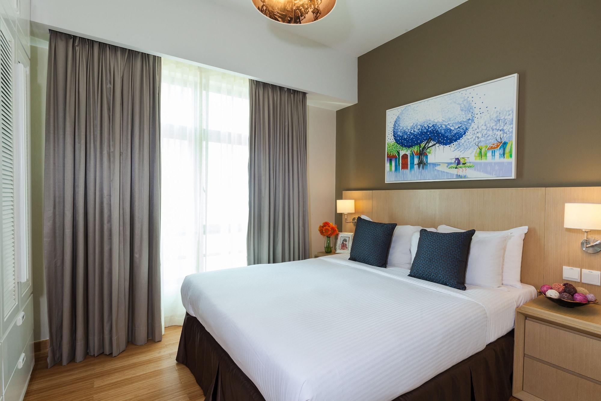 Somerset Ho Si Minh-város Kültér fotó A bedroom at the hotel